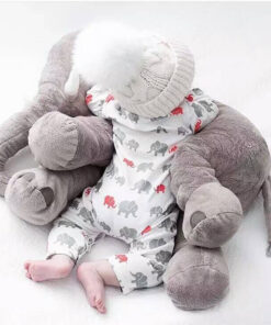 baby with elephant toy